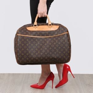 Authentic Alize 24 2 way travel bag Louis Vuitton